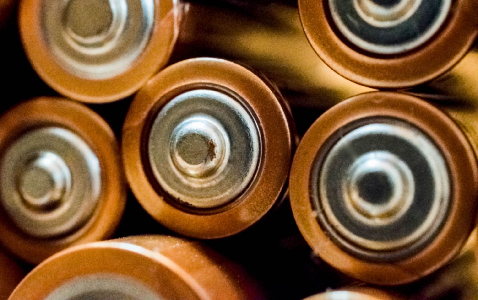 Close-up of large cylindrical cells in a battery bank.